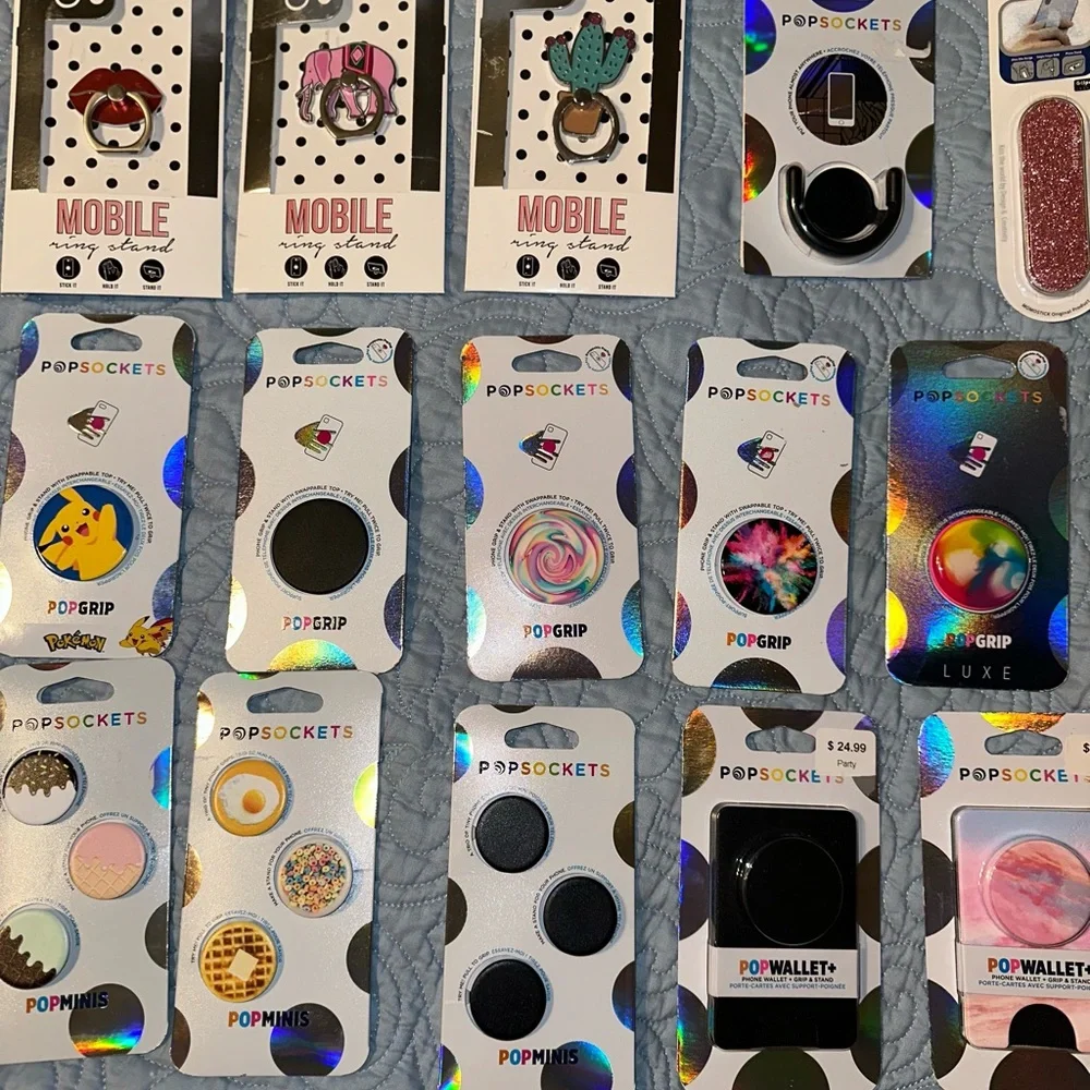 12 Brand New Popsockets. Each one is priced differently